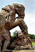 Orissa - Konarak - The Sun Temple. The war horses statues guarding the north staircase leading to the jagamohan.