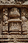 Konarak - Orissa. The Sun Temple, detail of the decorations of the platform of the jagamohana-deul complex, khakhara-mundi.