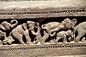 Orissa - Konarak - The Sun Temple. The frieze which runs continously all  around the base of the temple platform, decorated with more than ten thousands elephants . 
