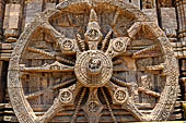 Konarak - Orissa. The Sun Temple, details of the twelve pairs of the great wheels arrayed along the platform. 