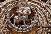 Konarak - Orissa. The Sun Temple, details of the twelve pairs of the great wheels arrayed along the platform. 