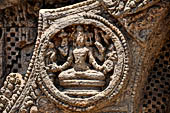 Konarak - Orissa. The Sun Temple, details of the twelve pairs of the great wheels arrayed along the platform. 