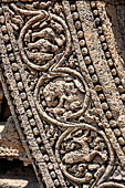 Konarak - Orissa. The Sun Temple, details of the twelve pairs of the great wheels arrayed along the platform. 