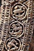 Konarak - Orissa. The Sun Temple, details of the twelve pairs of the great wheels arrayed along the platform. 