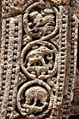 Konarak - Orissa. The Sun Temple, details of the twelve pairs of the great wheels arrayed along the platform. 