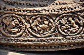 Konarak - Orissa. The Sun Temple, details of the twelve pairs of the great wheels arrayed along the platform. 
