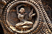 Konarak - Orissa. The Sun Temple, details of the twelve pairs of the great wheels arrayed along the platform. 