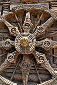 Konarak - Orissa. The Sun Temple, details of the twelve pairs of the great wheels arrayed along the platform. 