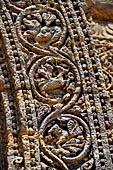 Konarak - Orissa. The Sun Temple, details of the twelve pairs of the great wheels arrayed along the platform. 