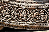 Konarak - Orissa. The Sun Temple, details of the twelve pairs of the great wheels arrayed along the platform. 