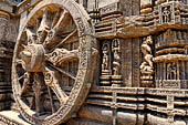 Konarak - Orissa. The Sun Temple, details of the twelve pairs of the great wheels arrayed along the platform. 