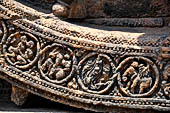 Konarak - Orissa. The Sun Temple, details of the twelve pairs of the great wheels arrayed along the platform. 