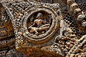 Konarak - Orissa. The Sun Temple, details of the twelve pairs of the great wheels arrayed along the platform. 