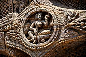 Konarak - Orissa. The Sun Temple, details of the twelve pairs of the great wheels arrayed along the platform. 