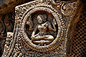 Konarak - Orissa. The Sun Temple, details of the twelve pairs of the great wheels arrayed along the platform. 