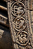 Konarak - Orissa. The Sun Temple, details of the twelve pairs of the great wheels arrayed along the platform. 