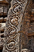 Konarak - Orissa. The Sun Temple, details of the twelve pairs of the great wheels arrayed along the platform. 