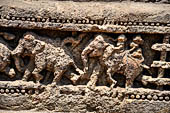 Orissa - Konarak - The Sun Temple. The frieze which runs continously all  around the base of the temple platform, decorated with more than ten thousands elephants . 
