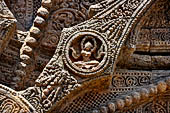 Konarak - Orissa. The Sun Temple, details of the twelve pairs of the great wheels arrayed along the platform. 