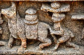 Orissa - Konarak - The Sun Temple. The frieze which runs continously all  around the base of the temple platform, decorated with more than ten thousands elephants . 