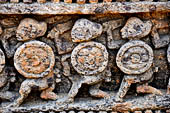 Orissa - Konarak - The Sun Temple. The frieze which runs continously all  around the base of the temple platform, decorated with more than ten thousands elephants . 