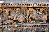 Orissa - Konarak - The Sun Temple. The frieze which runs continously all  around the base of the temple platform, decorated with more than ten thousands elephants . 
