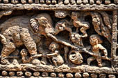 Orissa - Konarak - The Sun Temple. The frieze which runs continously all  around the base of the temple platform, decorated with more than ten thousands elephants . 
