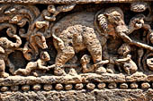 Orissa - Konarak - The Sun Temple. The frieze which runs continously all  around the base of the temple platform, decorated with more than ten thousands elephants . 