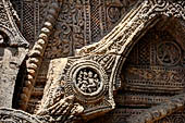 Konarak - Orissa. The Sun Temple, details of the twelve pairs of the great wheels arrayed along the platform. 
