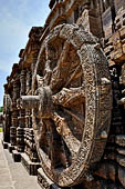 Konarak - Orissa. The Sun Temple, details of the twelve pairs of the great wheels arrayed along the platform. 