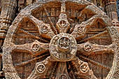 Konarak - Orissa. The Sun Temple, details of the twelve pairs of the great wheels arrayed along the platform. 
