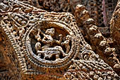 Konarak - Orissa. The Sun Temple, details of the twelve pairs of the great wheels arrayed along the platform. 