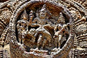 Konarak - Orissa. The Sun Temple, details of the twelve pairs of the great wheels arrayed along the platform. 