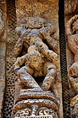 Konarak - Orissa. The Sun Temple, detail of the richly decorated high platform of the jagamohana-deul complex.