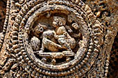 Konarak - Orissa. The Sun Temple, details of the twelve pairs of the great wheels arrayed along the platform. 