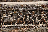 Orissa - Konarak - The Sun Temple. The frieze which runs continously all  around the base of the temple platform, decorated with more than ten thousands elephants . 