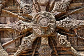 Konarak - Orissa. The Sun Temple, details of the twelve pairs of the great wheels arrayed along the platform. 
