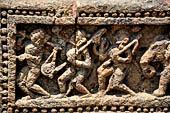 Orissa - Konarak - The Sun Temple. The frieze which runs continously all  around the base of the temple platform, decorated with more than ten thousands elephants . 