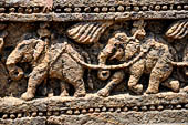 Orissa - Konarak - The Sun Temple. The frieze which runs continously all  around the base of the temple platform, decorated with more than ten thousands elephants . 