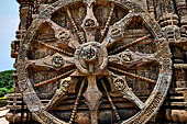 Konarak - Orissa. The Sun Temple, details of the twelve pairs of the great wheels arrayed along the platform. 