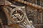 Konarak - Orissa. The Sun Temple, details of the twelve pairs of the great wheels arrayed along the platform. 