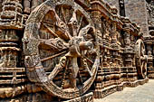 Konarak - Orissa. The Sun Temple, details of the twelve pairs of the great wheels arrayed along the platform. 