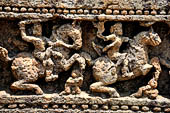 Orissa - Konarak - The Sun Temple. The frieze which runs continously all  around the base of the temple platform, decorated with more than ten thousands elephants . 
