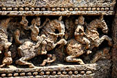 Orissa - Konarak - The Sun Temple. The frieze which runs continously all  around the base of the temple platform, decorated with more than ten thousands elephants . 