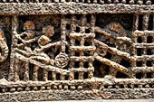 Orissa - Konarak - The Sun Temple. Elephant trap on the frieze of the base of the temple platform.