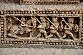 Orissa - Konarak - The Sun Temple. The frieze which runs continously all  around the base of the temple platform, decorated with more than ten thousands elephants . 
