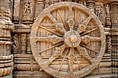 Konarak - Orissa. The Sun Temple, details of the twelve pairs of the great wheels arrayed along the platform. 