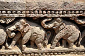 Orissa - Konarak - The Sun Temple. The frieze which runs continously all  around the base of the temple platform, decorated with more than ten thousands elephants . 