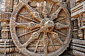 Konarak - Orissa. The Sun Temple, details of the twelve pairs of the great wheels arrayed along the platform. 