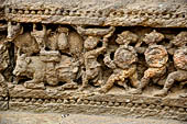 Orissa - Konarak - The Sun Temple. The frieze which runs continously all  around the base of the temple platform, decorated with more than ten thousands elephants . 